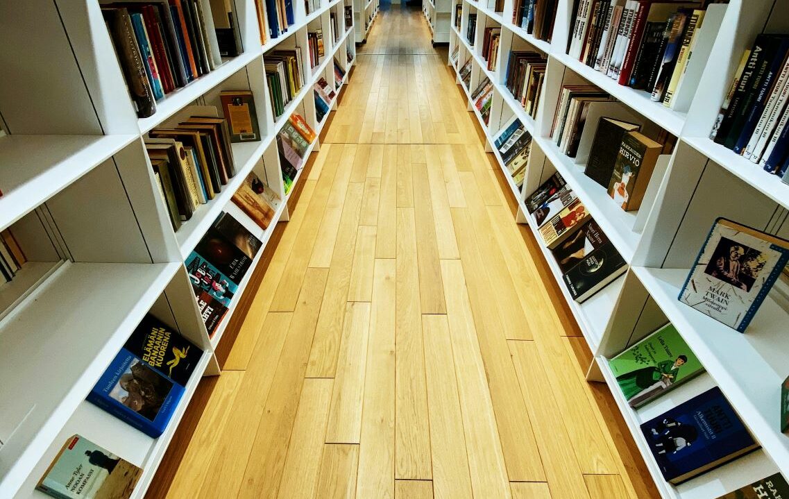 Library shelves with wooden floor