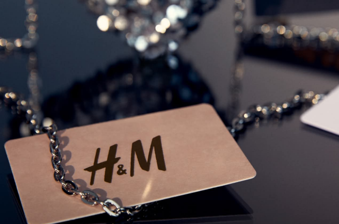 H&M promotional image featuring the brand and contemporary accessories